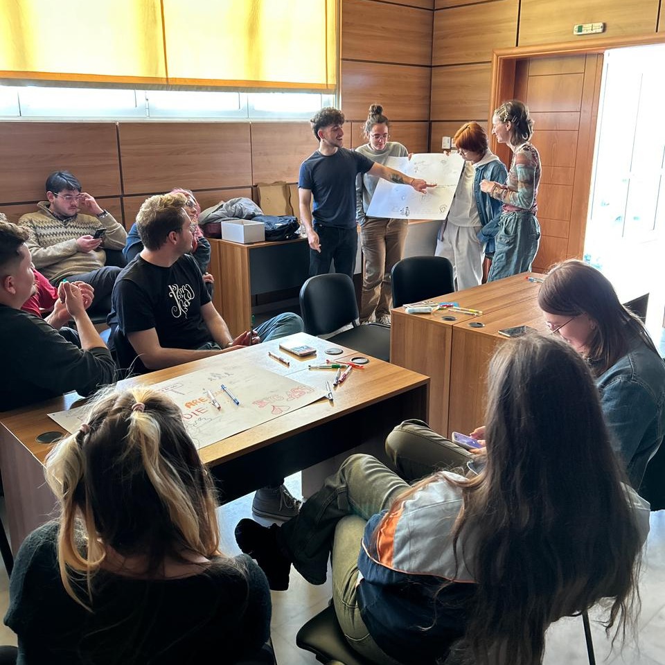 Workshop planning — group huddle during BREATHE